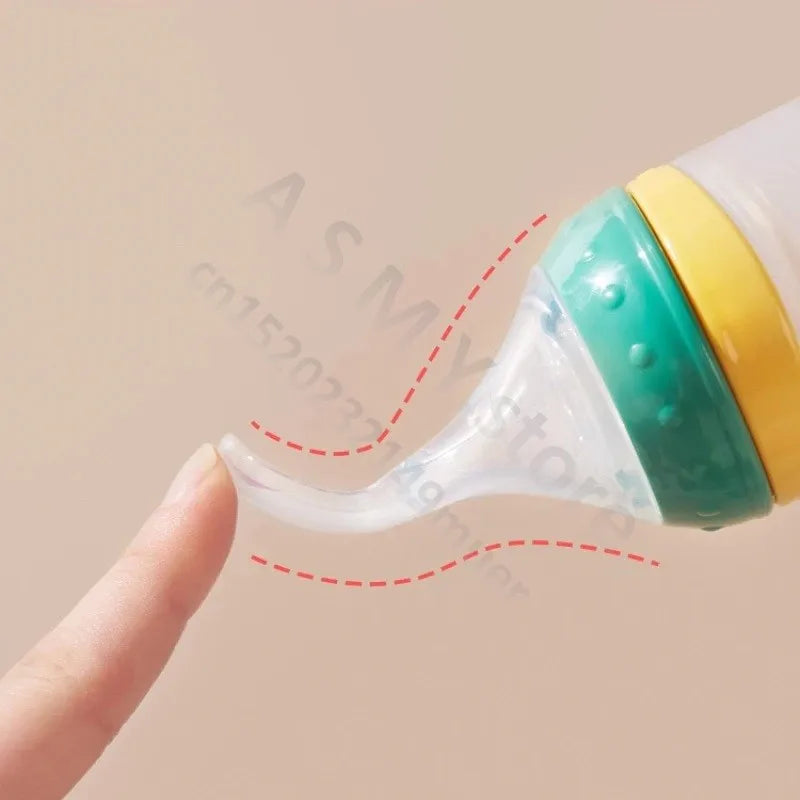 Silicone Squeeze Feeding Bottle with Baby Spoon