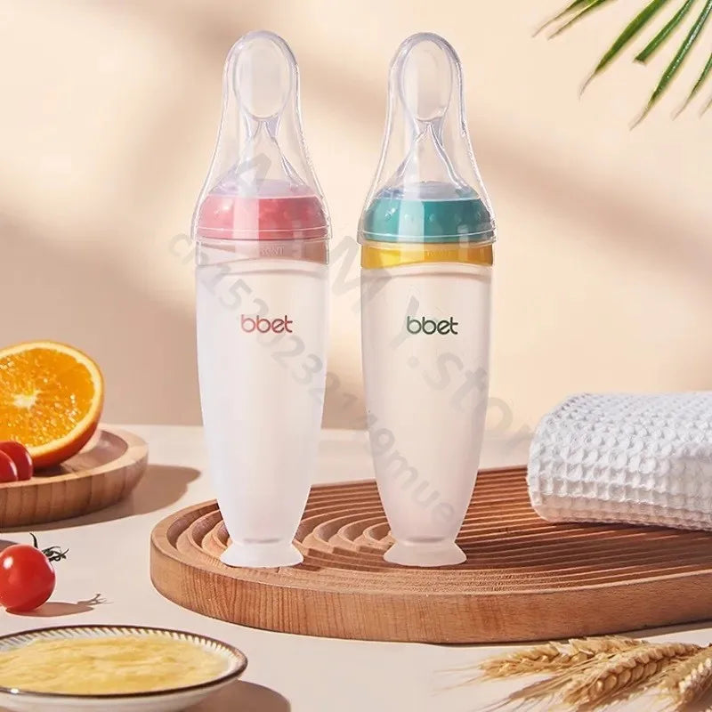 Silicone Squeeze Feeding Bottle with Baby Spoon
